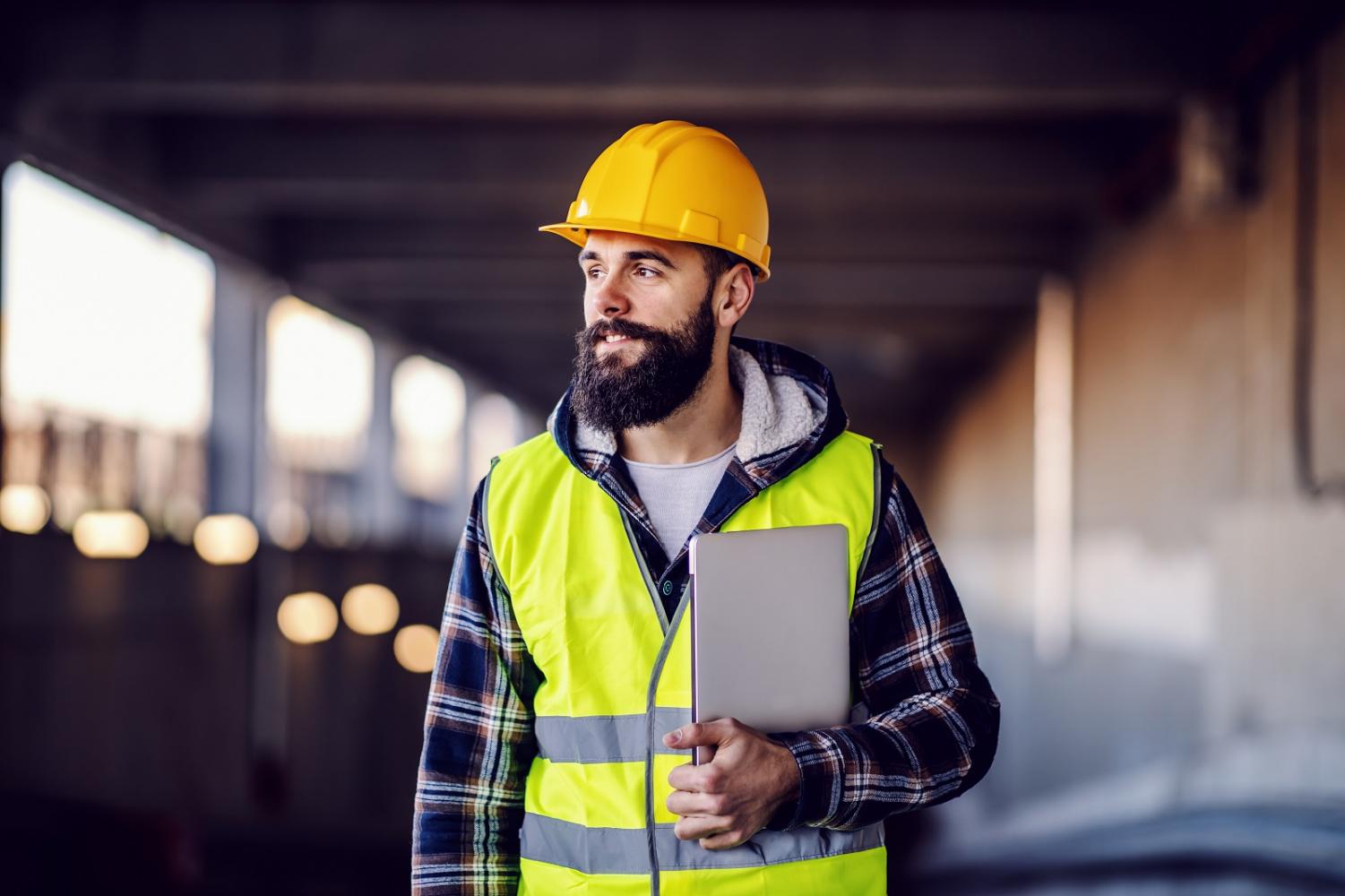 Man wearing hardhat at work. 